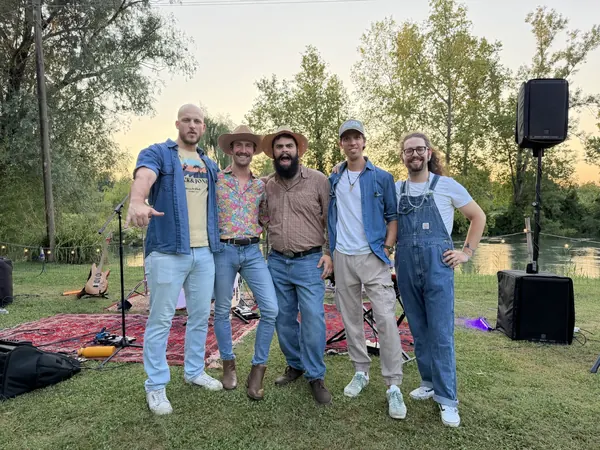 Hot Joe & The Coffeekillers, country band from Brescia, all five by the river at sunset