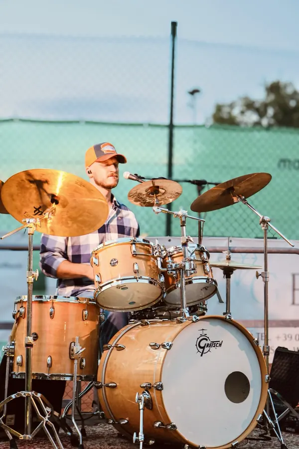 Miglio behind his Gretsch drum kit during an open-air country show